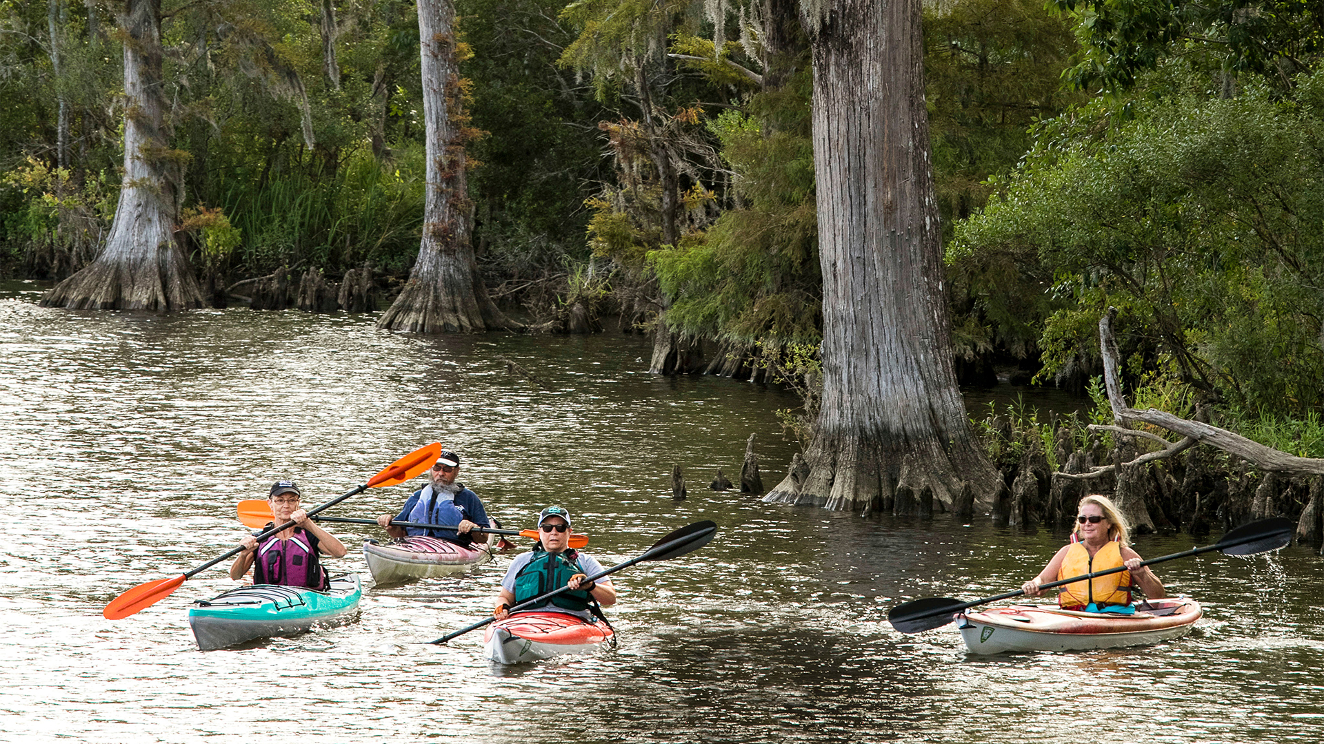 Family kayaking on the Tar-Pamlico water trail in Washington NC
