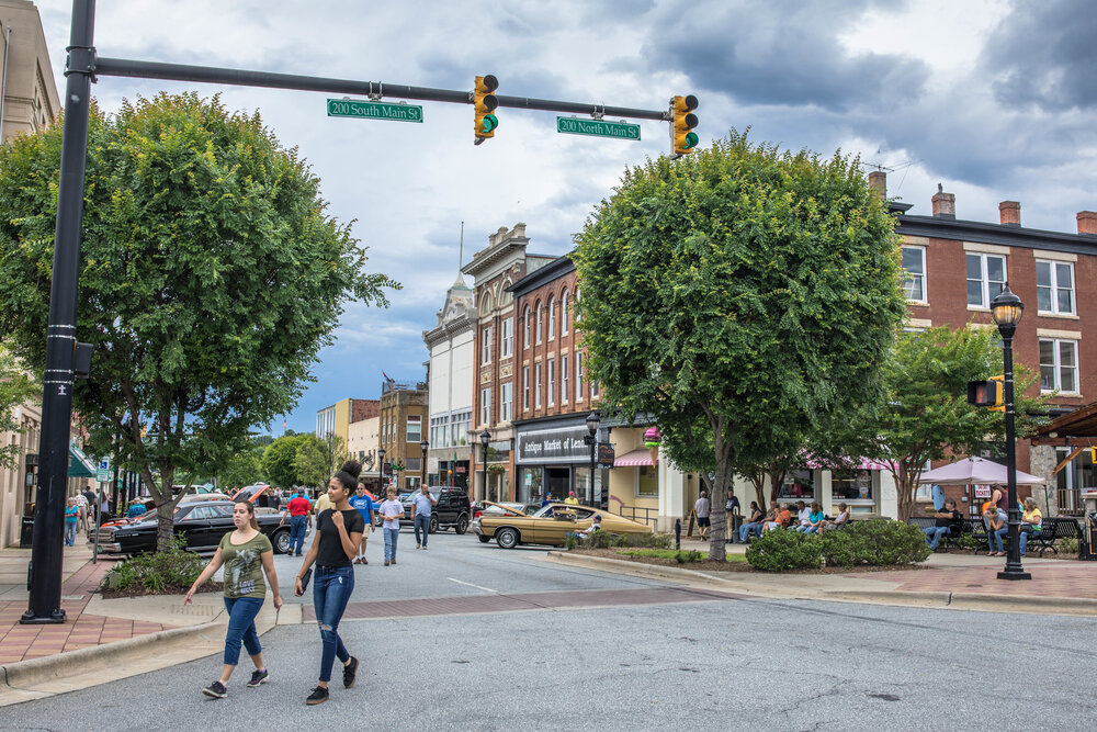 People enjoying car show in downtown Lenoir NC.